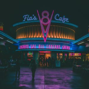 Experience The Retro Neon Glow Of Flo's V8 Café In Anaheim At Night, Capturing Its Nostalgic Charm And Lively Atmosphere.
