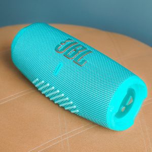 Teal JBL Portable Bluetooth Speaker With Modern Design, Perfect For Wireless Music Streaming.