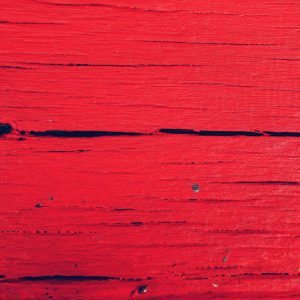 Close Up Of A Textured Red Wooden Surface, Perfect For Vivid Backgrounds And Design Use.
