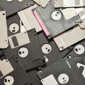 A Collection Of Vintage Floppy Disks Showcasing Retro Data Storage Technology.