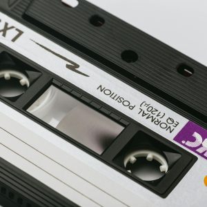 Close Up Of A Classic Cassette Tape With Visible Brand And Details On A White Background.