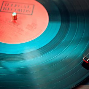 A Detailed Close Up View Of A Vintage Vinyl Record Spinning On A Turntable, Capturing Its Nostalgic Beauty.