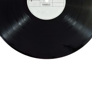A Classic Black Vinyl Record Isolated On A White Background.