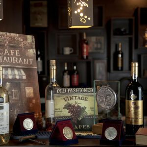 A Classy Arrangement Of Wine Bottles In A Vintage Themed Restaurant Setting.