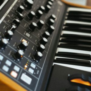 An Artistic Close Up Of A Synth Keyboard With Focus On Controls, Ideal For Music And Technology Themes.