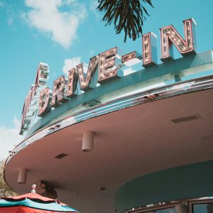 Vintage Drive In Restaurant With Neon Sign And Retro Design, Perfect For Nostalgic Travelers.