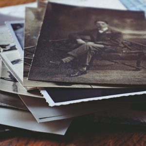 A Nostalgic Collection Of Vintage Photos And Handwritten Letters, Depicting Memories And Stories From The Past.