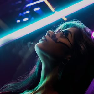 Artistic Portrait Of A Woman With Neon Lights In São Paulo. Vibrant And Energetic Night Scene.