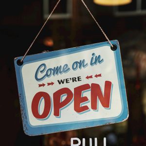 Vintage Style Open Sign Welcoming Customers Into A Nashville Shop. Perfect For Illustrating Business Atmosphere.