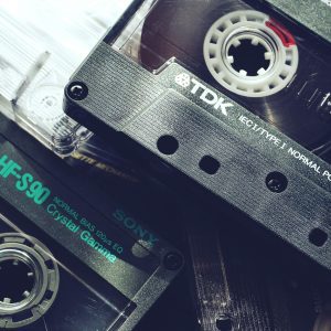 A Nostalgic Close Up Of Vintage Cassette Tapes Showcasing 1980s Audio Technology And Retro Vibes.