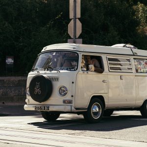 Classic Volkswagen Camper Van Parked On An Urban Street, Evoking A Retro Feel.