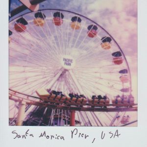 Retro Style Photo Capturing Pacific Park's Ferris Wheel At Santa Monica Pier.