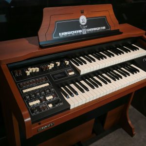 Classic Wooden Electronic Organ Featuring Dual Keyboards And Sound Controls, Ideal For Music Enthusiasts.
