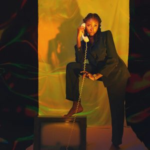 Stylish Portrait Of Woman With Vintage Phone And TV, Artistic Lighting And Composition.