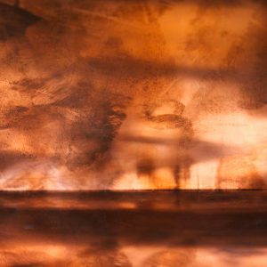 Warm Toned Abstract Texture With Dynamic Brush Strokes For Artistic Use.