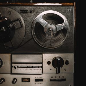 Close Up Of A Classic Vintage Reel To Reel Tape Recorder Showcasing Retro Audio Equipment.
