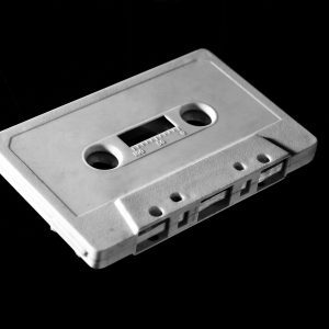 Monochrome Photo Of A Vintage Cassette Tape Evokes Nostalgia And Retro Vibes.