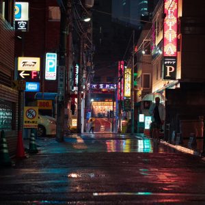 Explore The Vibrant And Illuminated Neon Streets Of Tokyo At Night, Capturing The Dynamic Energy Of The Urban Landscape.