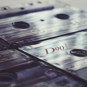 A Detailed Close Up Of Vintage Cassette Tapes Showcasing Retro Nostalgia With A Classic Feel.