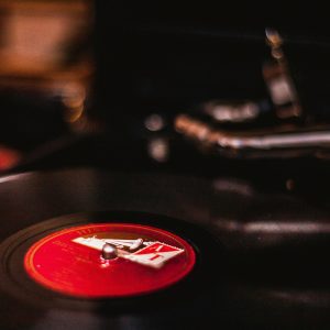 Close Up Of A Vintage Turntable Playing A Vinyl Record, Capturing The Nostalgic Feel Of Analogue Music Mediums.