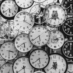 A Black And White Image Displaying A Diverse Array Of Vintage Wall Clocks.