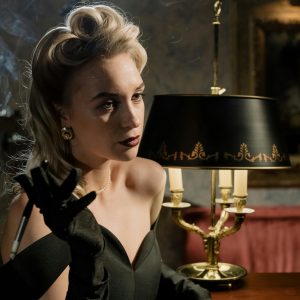 Elegant Woman In Vintage Noir Setting, Smoking With Alluring Expression, Glamorous Style.