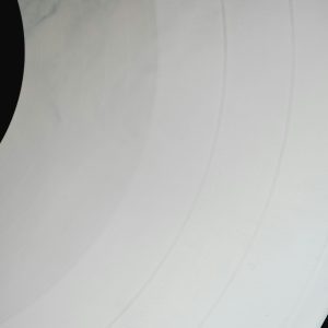 Abstract Minimalist Design With A Circular Black And White Geometric Pattern.