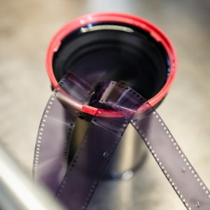 Close Up Of Photographic Film In A Developing Tank, Showing Analog Photography Practice.