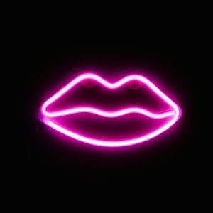 Vibrant Neon Pink Lips Decoration Against A Dark Background, Perfect For Artistic Spaces.