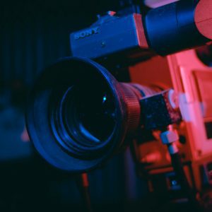 Artistic Close Up Of A Vintage Video Camera Lens In Dramatic Lighting.