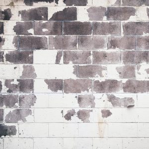 Detailed Grunge Texture Of An Old Brick Wall With Peeling Paint And Rustic Feel.