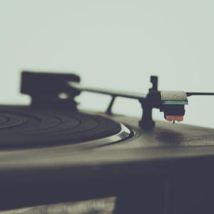 Detailed View Of A Vintage Turntable, Highlighting The Stylus And Platter For Retro Audio Enthusiasts.