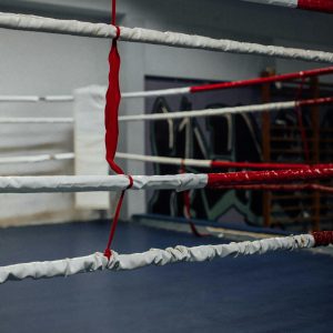 A Close Up View Of An Unoccupied Boxing Ring Indoors Showcasing Training Ambiance.