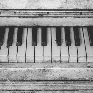 Black And White Close Up Of Vintage Piano Keys, Showcasing Musical Nostalgia.